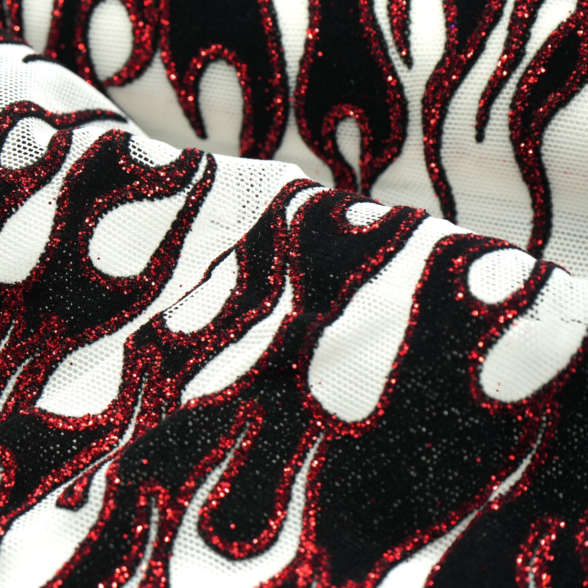 Fiery Glittered Flocked Stretch Mesh Fabric | Blue Moon Fabrics